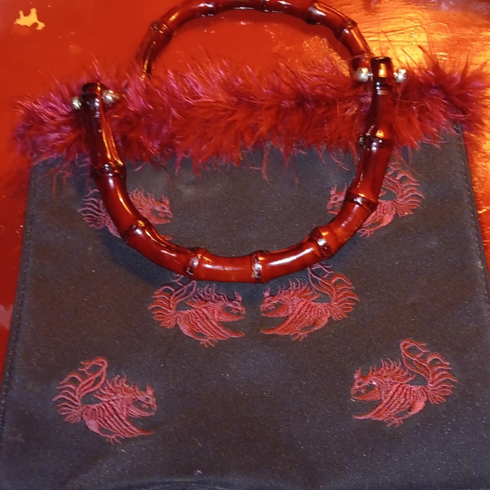 South Carolina Gamecock purse. Inside has one pocket with a snap